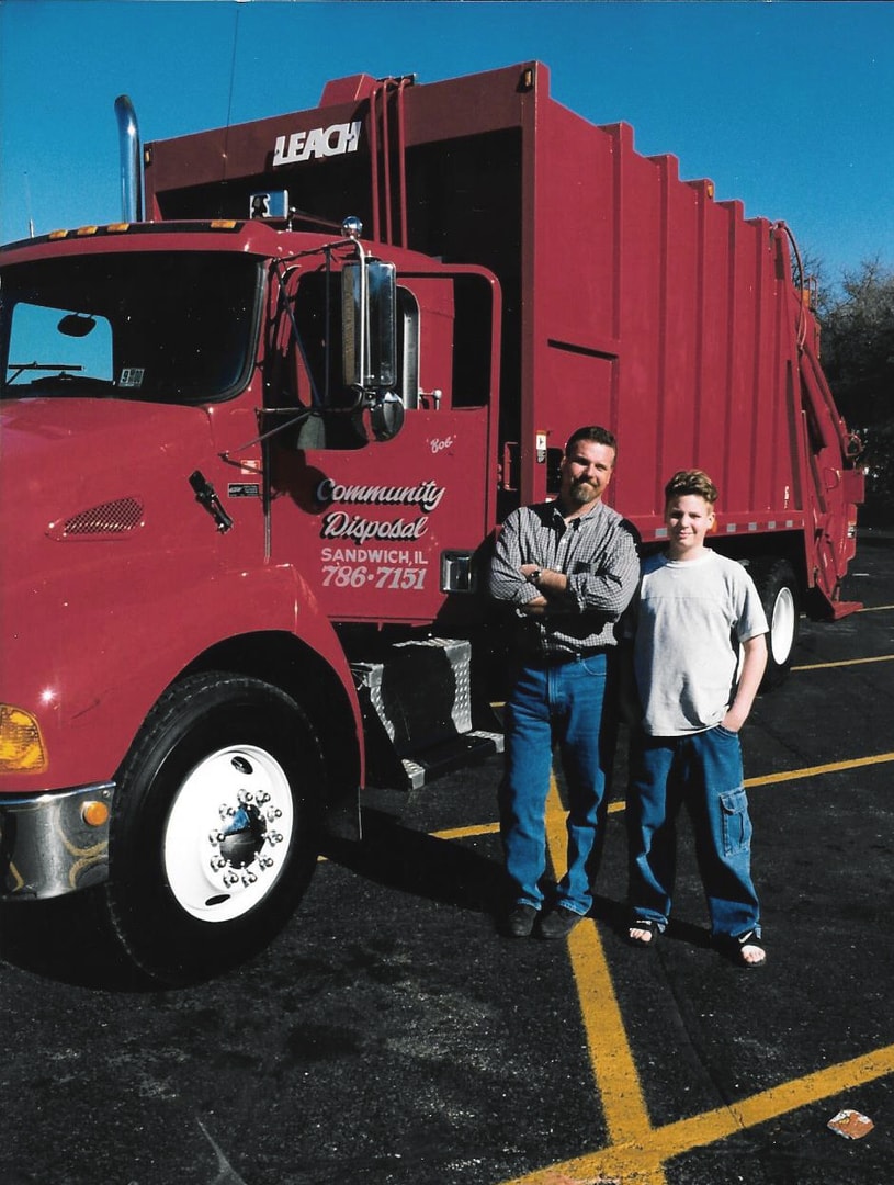 Bob and Bobby Voss with a Community Disposal truck